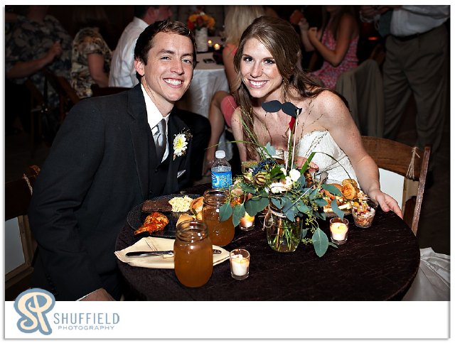 bride and groom, reception, head table, mustache photo prop, nashville